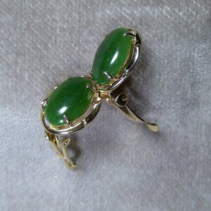 Green and gold colored clip on earrings oval